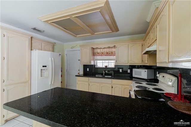 kitchen with a sink, visible vents, white appliances, crown molding, and under cabinet range hood