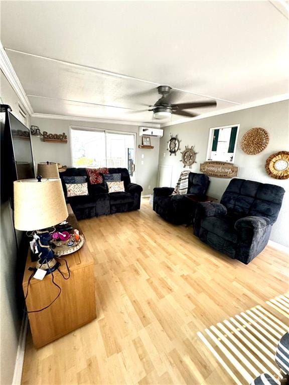 379 Sand Dollar Dr, Port Isabel, TX 78578 - living room featuring a ceiling fan, wood finished floors, and ornamental molding