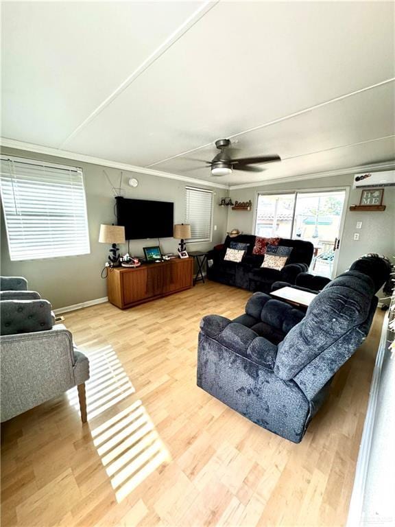 379 Sand Dollar Dr, Port Isabel, TX 78578 - living room featuring wood finished floors, a ceiling fan, and crown molding
