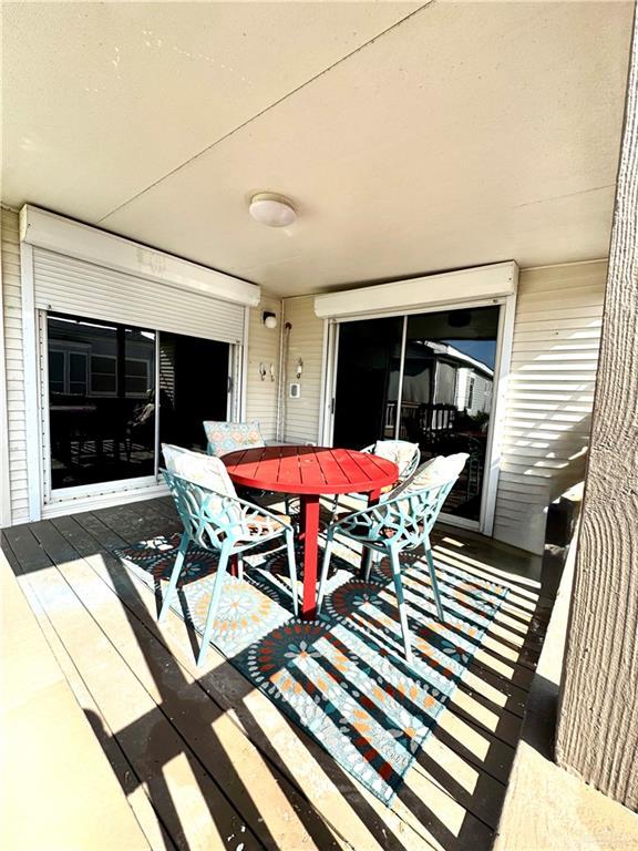 379 Sand Dollar Dr, Port Isabel, TX 78578 - deck featuring outdoor dining space