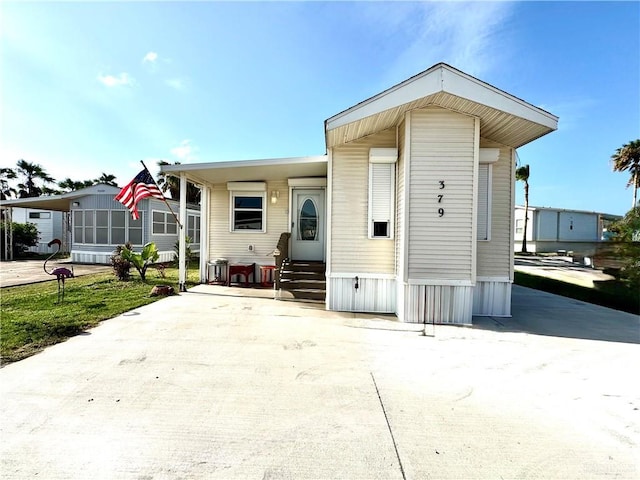 379 Sand Dollar Dr, Port Isabel, TX 78578 - manufactured / mobile home with entry steps