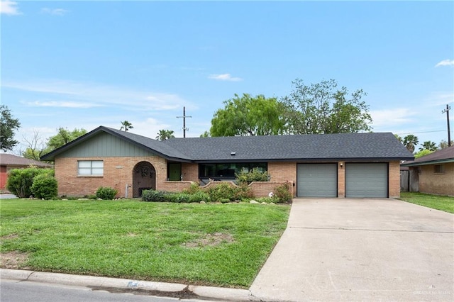 ranch-style house featuring a garage and a front lawn