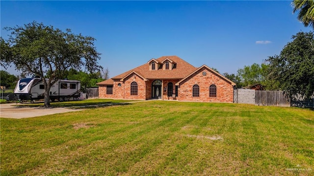 view of front of home with a front yard