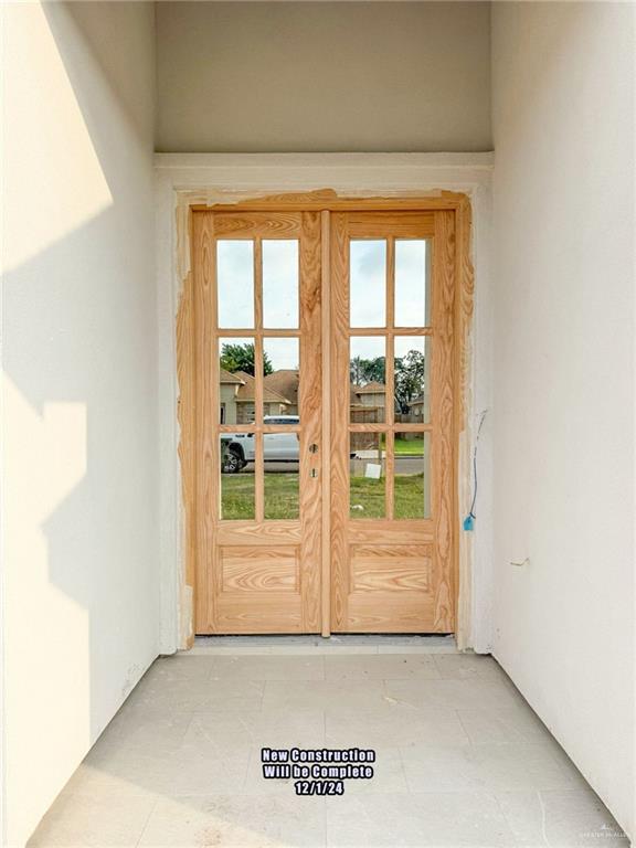 view of exterior entry with french doors