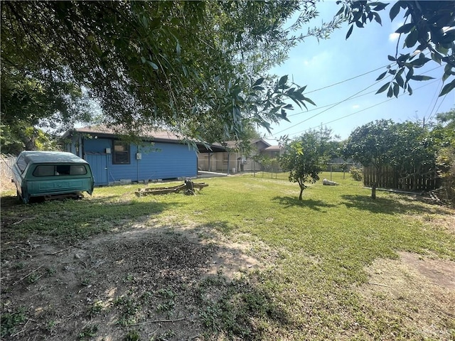 view of yard with fence