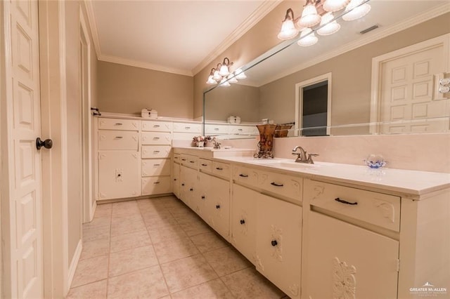 bathroom featuring tile patterned flooring, ornamental molding, vanity, and a chandelier