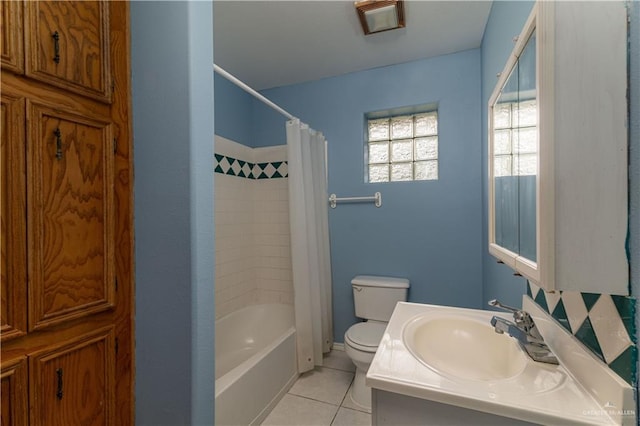 full bathroom featuring tile patterned flooring, vanity, shower / bath combination with curtain, and toilet