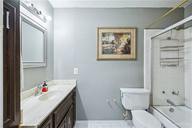 bathroom featuring vanity, toilet, baseboards, and washtub / shower combination