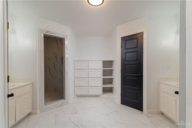 bathroom featuring vanity and walk in shower