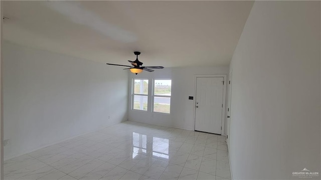 empty room featuring ceiling fan