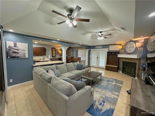 tiled living room featuring ceiling fan, lofted ceiling, and billiards