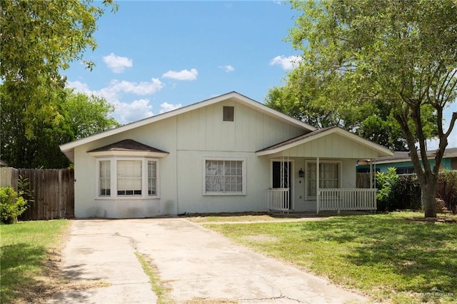 604 N Padre Ave, Weslaco, TX 78596 - view of front of property with covered porch and concrete driveway