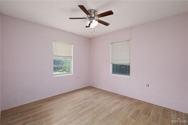 604 N Padre Ave, Weslaco, TX 78596 - empty room featuring wood finished floors and ceiling fan