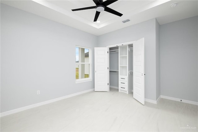 905 Magnolia St, Mission, TX 78574 - unfurnished bedroom featuring a raised ceiling, baseboards, a closet, a ceiling fan, and recessed lighting