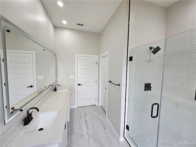 bathroom featuring vanity and walk in shower