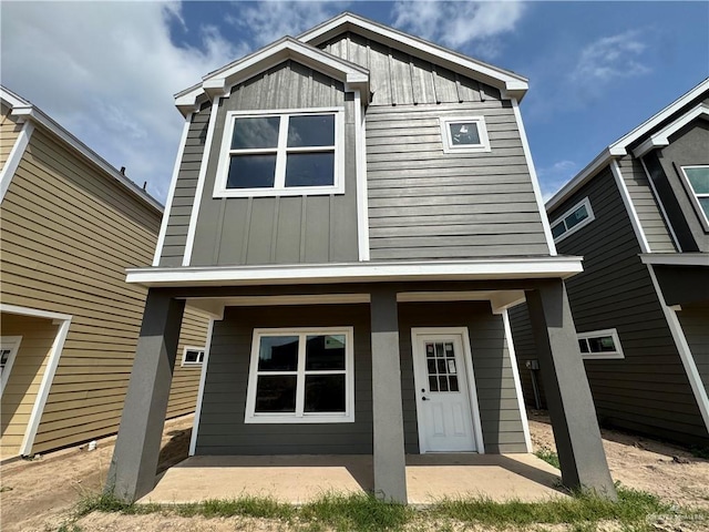 view of front of house featuring board and batten siding and a porch