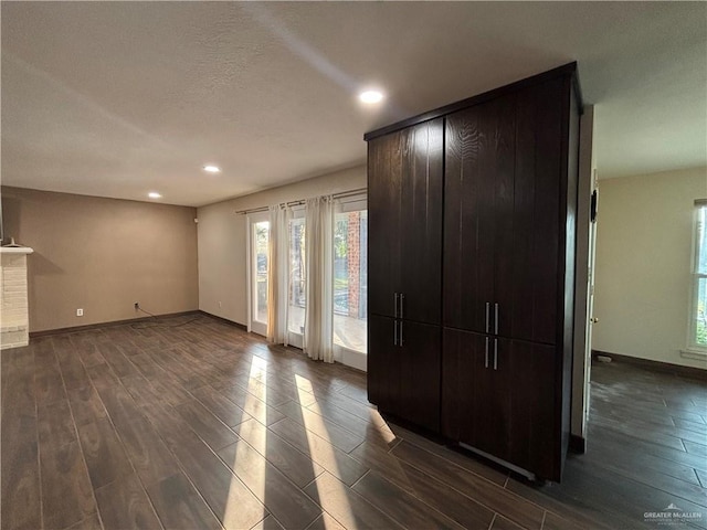1060 Timothy St, San Benito, TX 78586 - entryway featuring recessed lighting and dark wood-type flooring