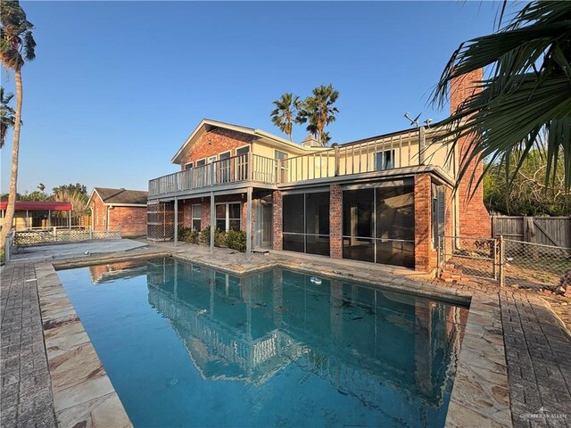 1060 Timothy St, San Benito, TX 78586 - view of swimming pool featuring a patio area and a gate