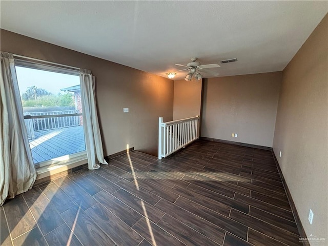 1060 Timothy St, San Benito, TX 78586 - unfurnished room featuring wood tiled floors and ceiling fan