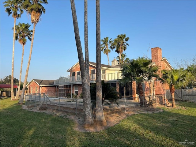 1060 Timothy St, San Benito, TX 78586 - rear view of property with brick siding