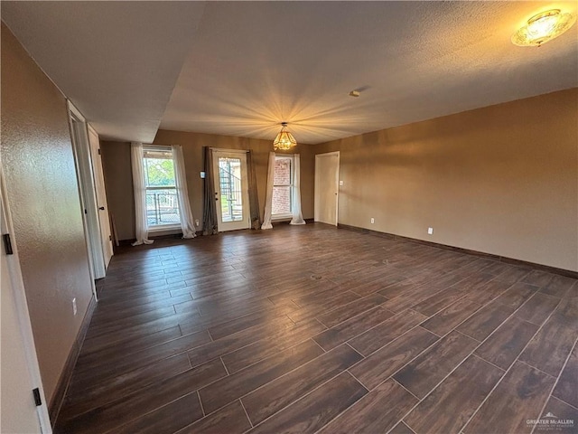 1060 Timothy St, San Benito, TX 78586 - unfurnished room with dark wood finished floors