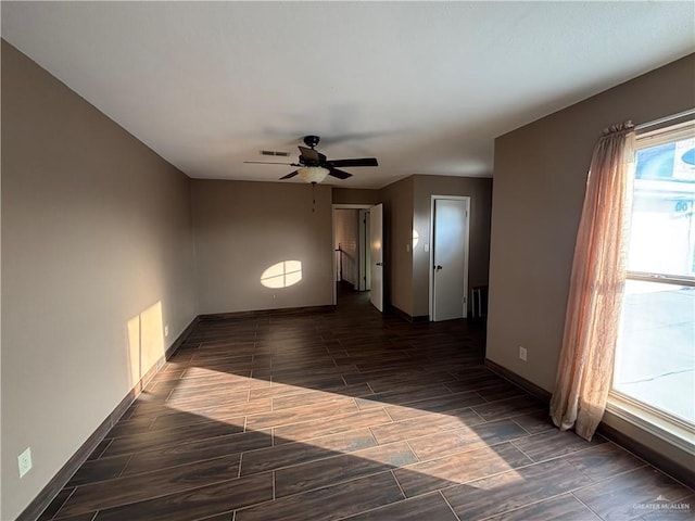 1060 Timothy St, San Benito, TX 78586 - spare room with wood tiled floors and a ceiling fan