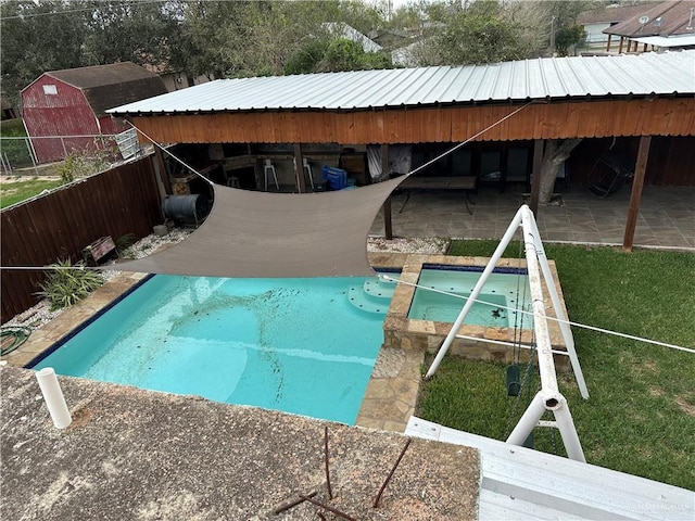 view of pool featuring a yard