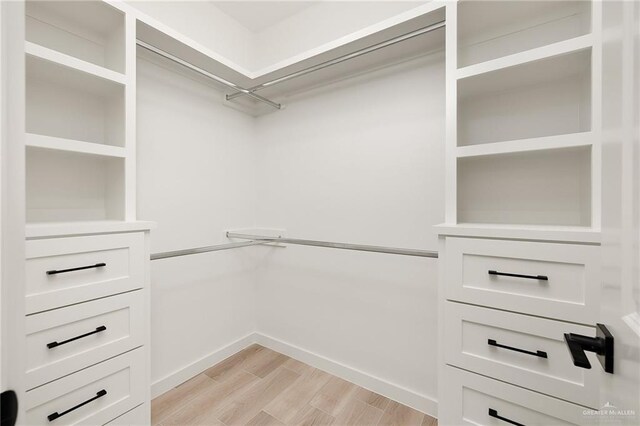 3508 E Kidd Ave, Edinburg, TX 78542 - walk in closet featuring light wood-type flooring