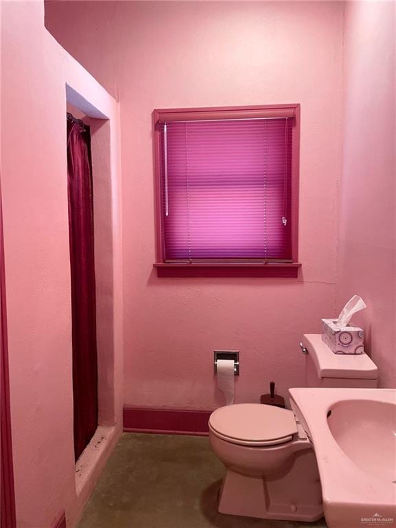 bathroom featuring toilet