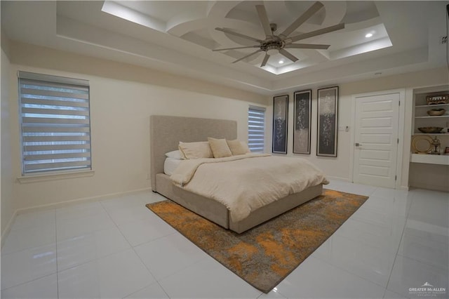 bedroom featuring tile patterned floors, a ceiling fan, coffered ceiling, recessed lighting, and baseboards