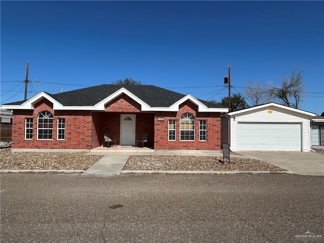 single story home with a garage