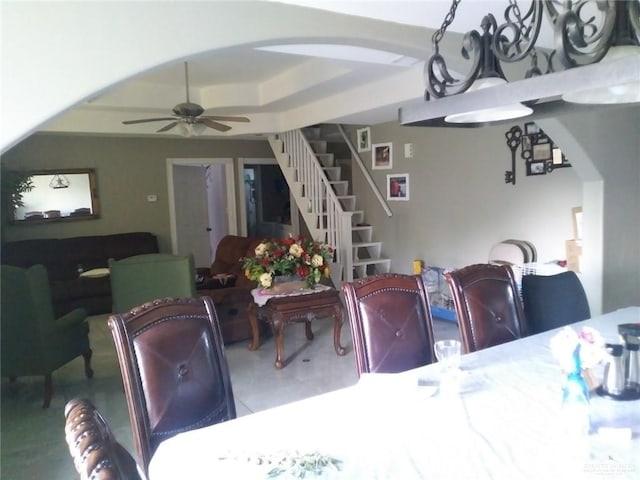 dining space featuring ceiling fan