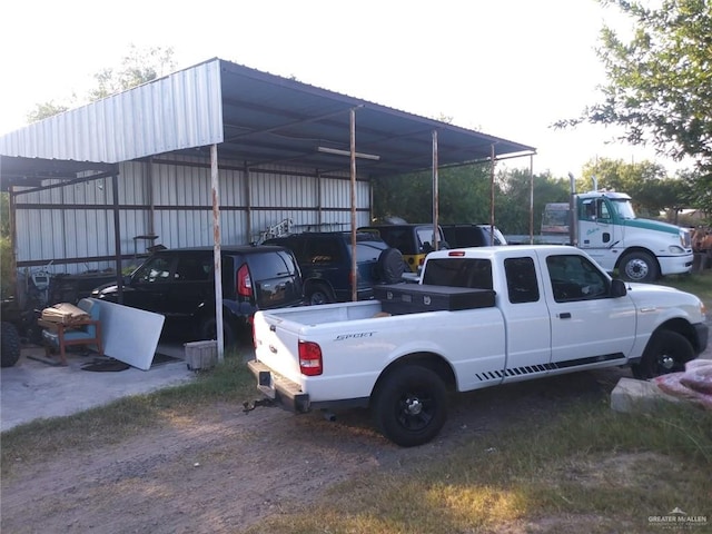 view of parking with a carport