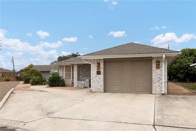 ranch-style house featuring a garage