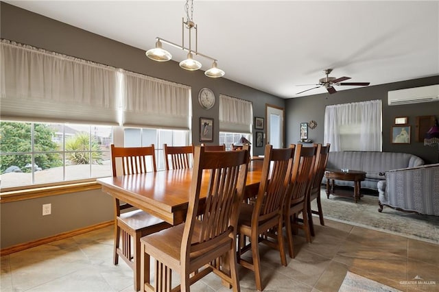 dining area featuring a wall mounted air conditioner and ceiling fan