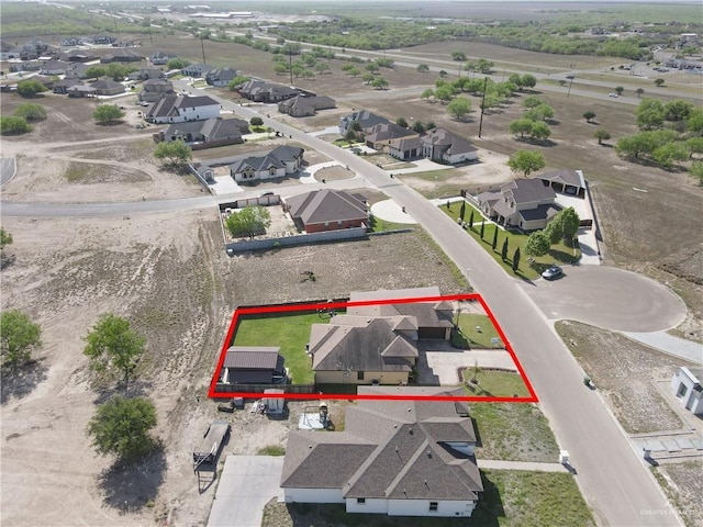 drone / aerial view with a residential view