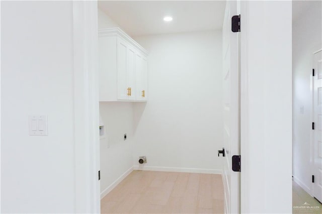 2221 N Woody St, Edinburg, TX 78541 - washroom featuring hookup for an electric dryer, cabinet space, and recessed lighting