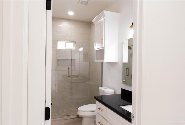 2221 N Woody St, Edinburg, TX 78541 - bathroom featuring vanity, a shower stall, and recessed lighting
