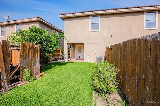 3008 S M St Unit 4, Mcallen, TX 78503 - back of property with stucco siding and central AC unit