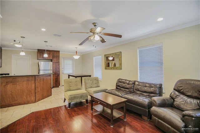 3008 S M St Unit 4, Mcallen, TX 78503 - living room featuring crown molding, a ceiling fan, wood-type flooring, and recessed lighting
