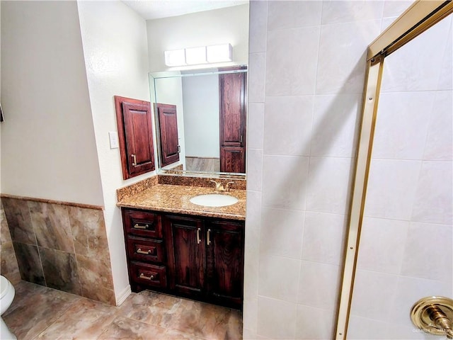 702 Clifford Dr, Weslaco, TX 78596 - bathroom with vanity and toilet