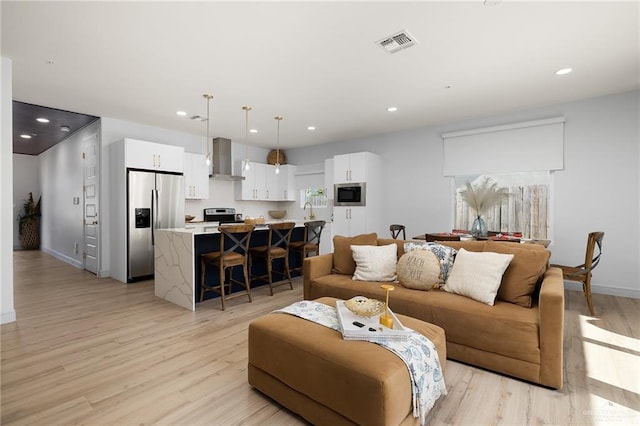 living room featuring light hardwood / wood-style flooring