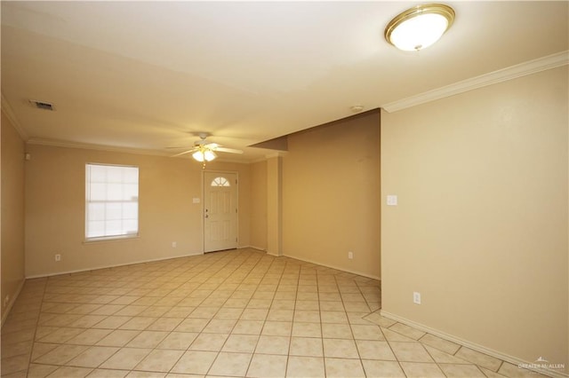 unfurnished room featuring light tile patterned floors, ceiling fan, and ornamental molding