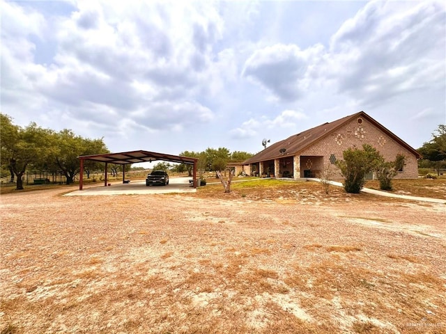 view of yard featuring a carport