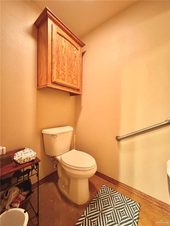 bathroom featuring toilet