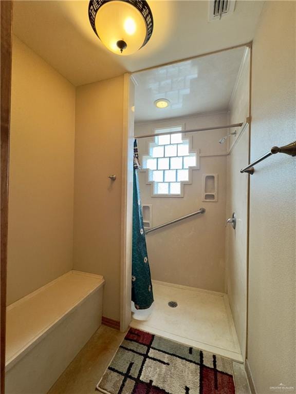 bathroom with a shower with shower curtain