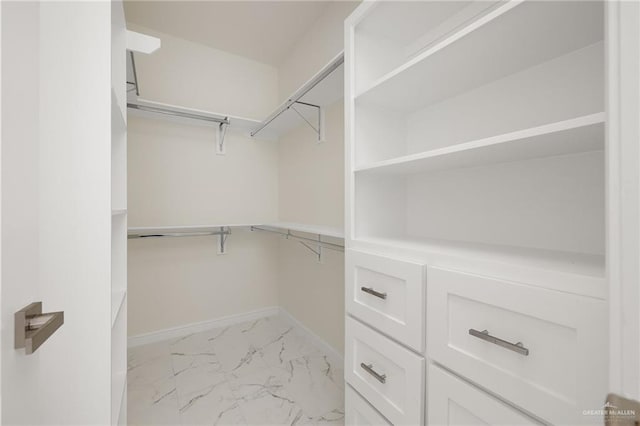 1921 Lime St, San Juan, TX 78589 - spacious closet featuring light marble finish floors