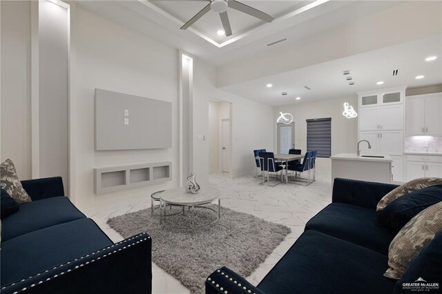 1921 Lime St, San Juan, TX 78589 - living area featuring recessed lighting, ceiling fan, and light marble finish floors