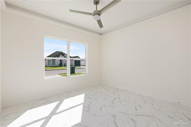 1921 Lime St, San Juan, TX 78589 - unfurnished room with marble look tile flooring, baseboards, a ceiling fan, and ornamental molding