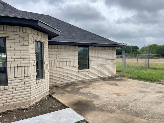 view of home's exterior with a patio area